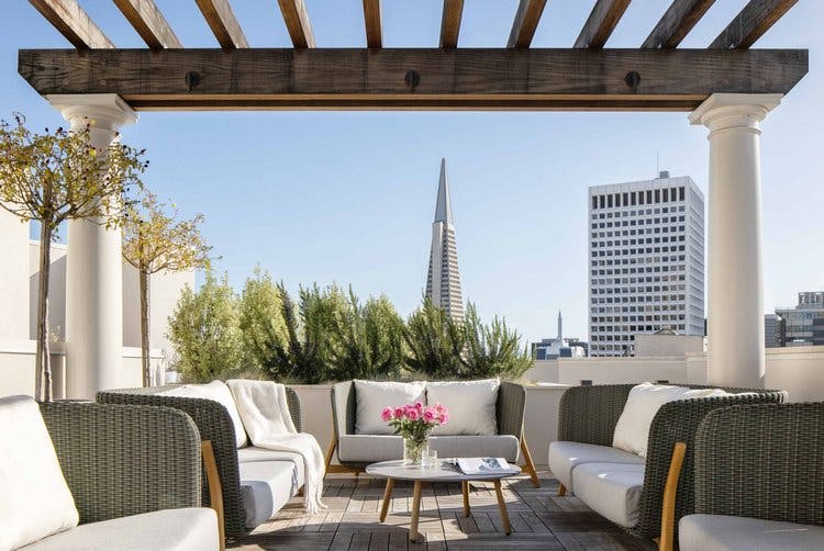 The Skyline lounge in Crescent Nob Hill has gorgeous views of the city and is complete with seating and a warming fireplace.