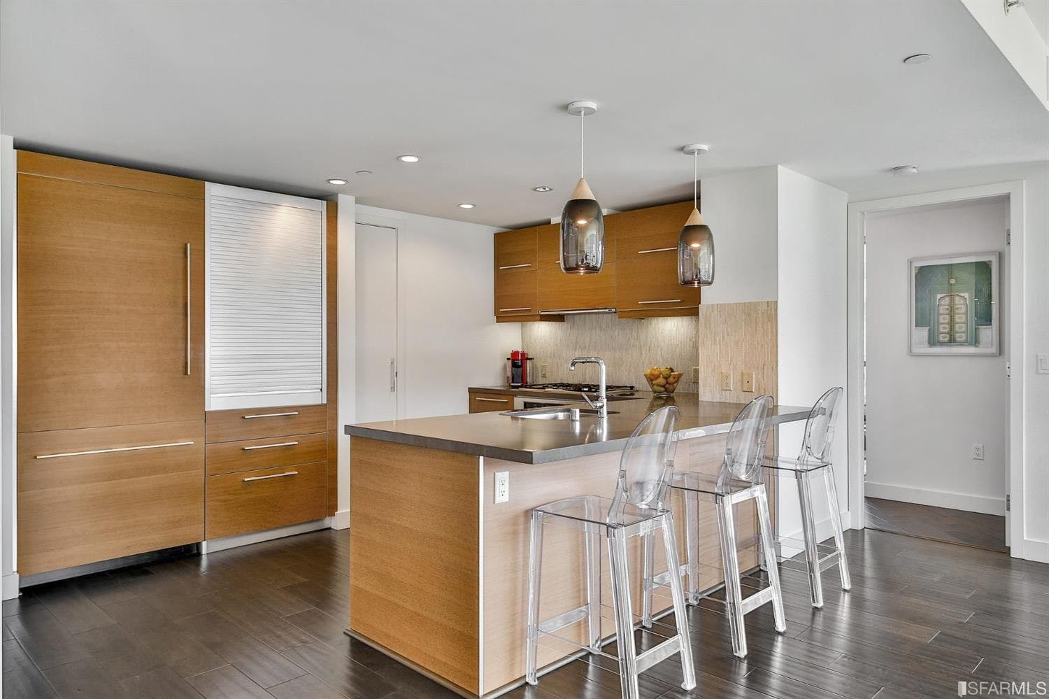 The kitchens in the Madrone are adorned with Caesarstone countertops and stainless steel Bosch appliances, as well as stylish wooden cabinetry. 