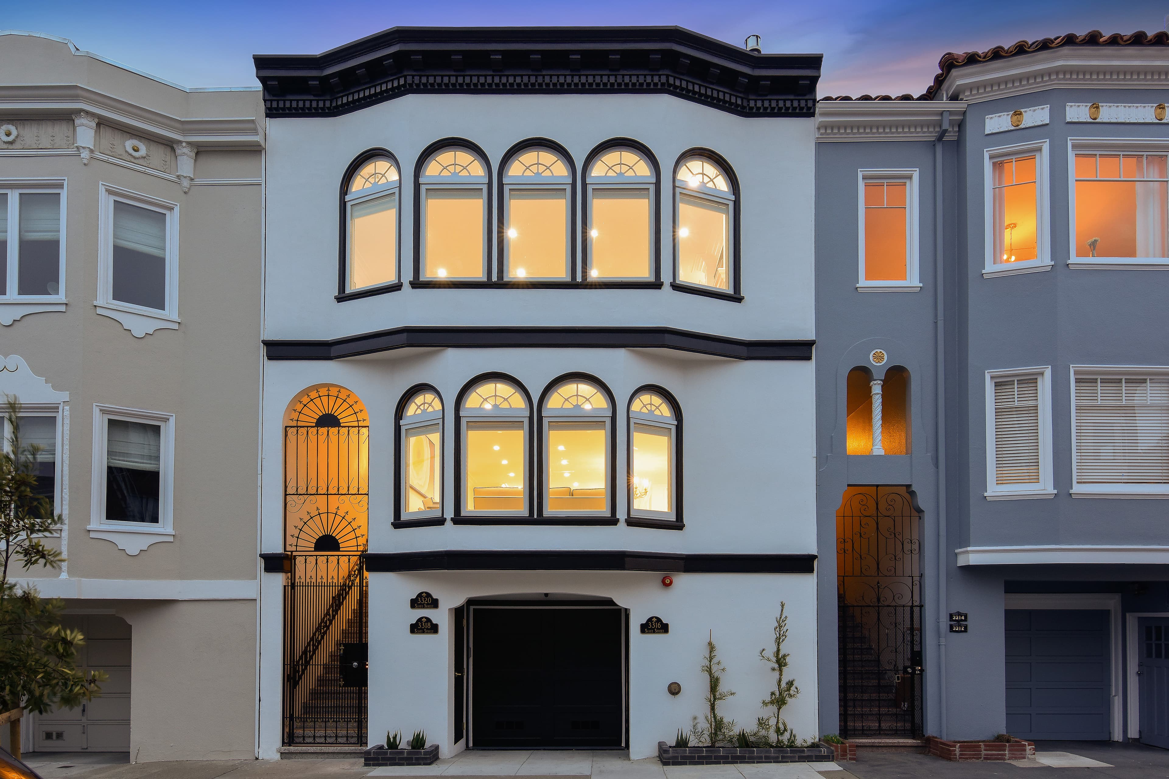 Twilight front facade of 3316-3320 Scott in the Marina.