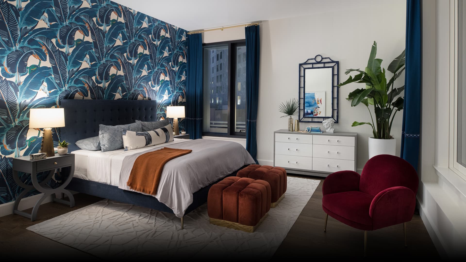 The master bedroom in an Aronson residence is expansive and spacious, with a significantly sizable dressing room that is perfect for its residents. 