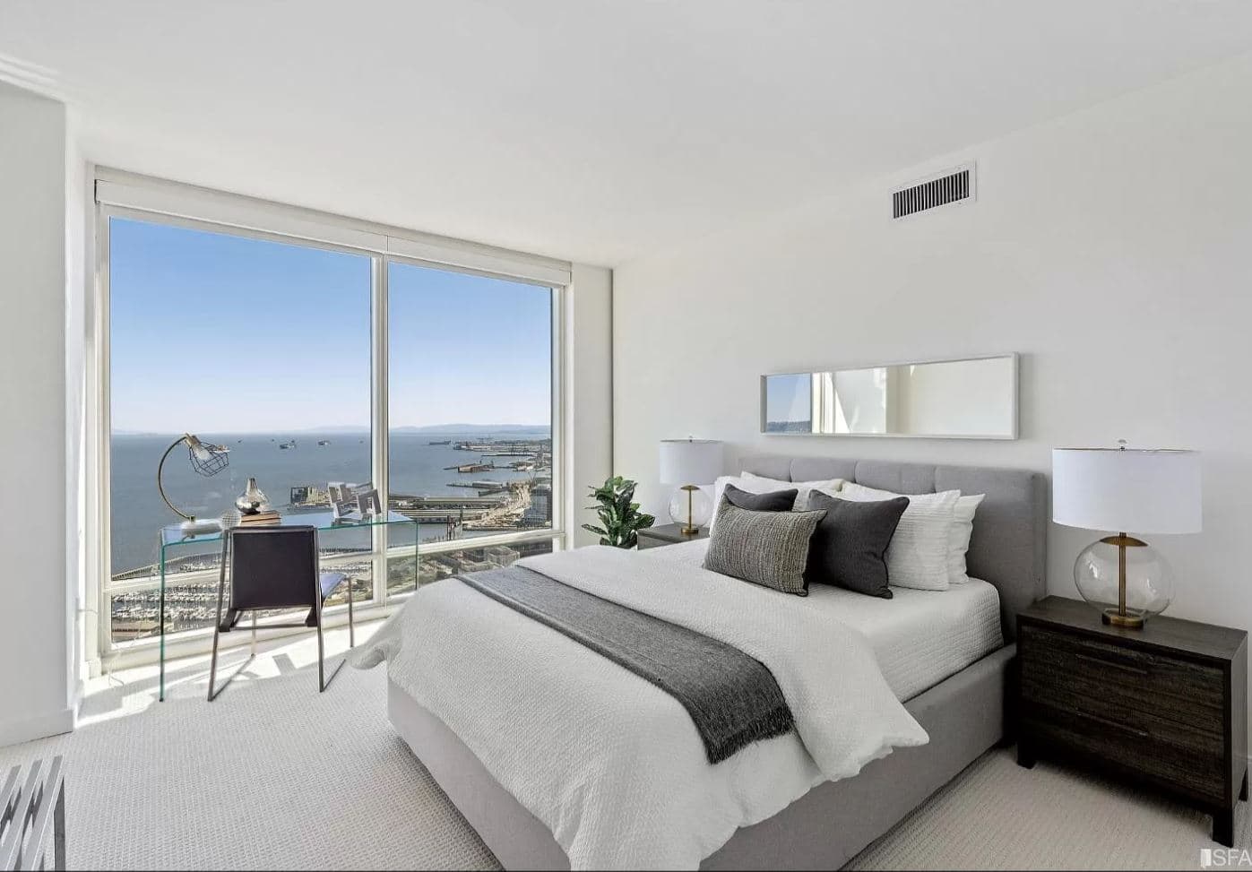 The bedrooms in One Rincon Hill are elegant and classy, their palette a simple design that lends itself to the style of those who reside in it. 