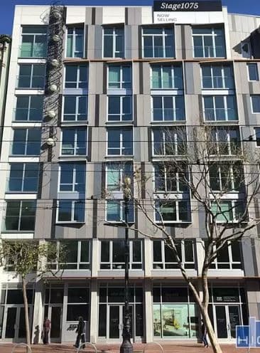 Stage 1075 is 8 stories tall and holds around 100 condominiums. 