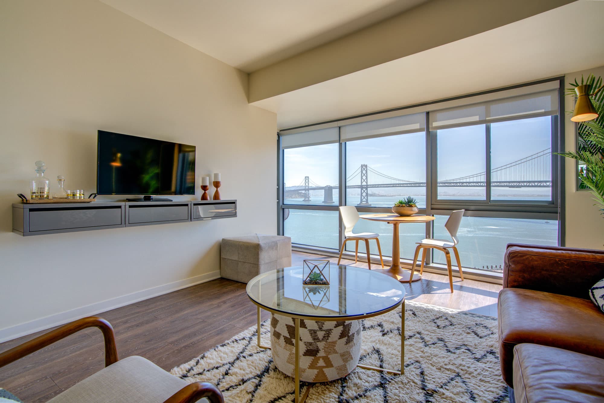 Hardwood flooring, bay windows, and fantastical views combine to create the perfect space to relax, wind down, or entertain. 