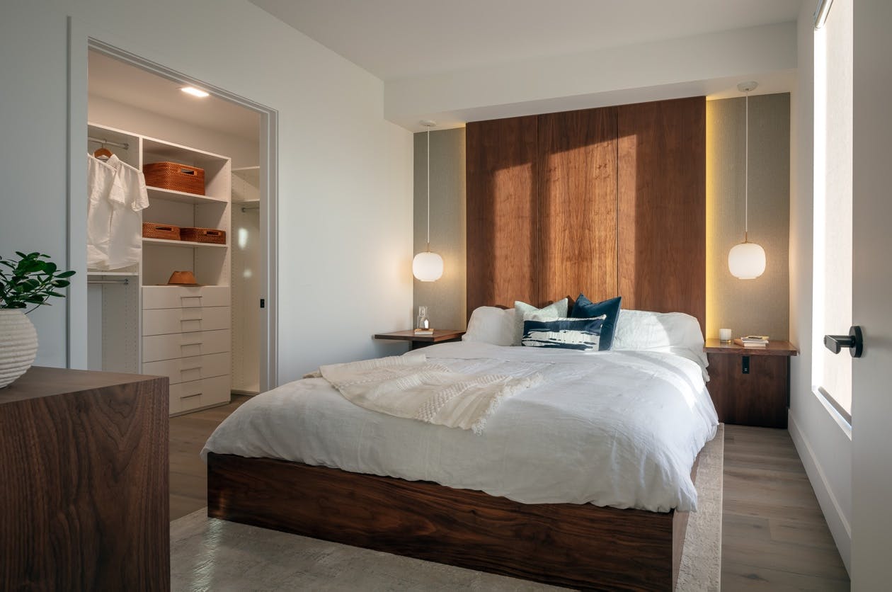 The bedrooms are complete with large closets and sliding doors that maximize natural lighting.