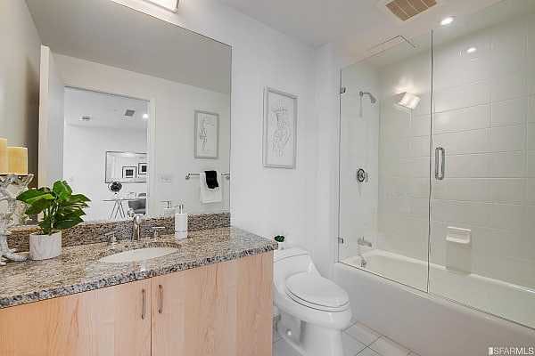 The Glassworks' bathrooms are clean, sleek, and modern, allowing for a contemporary design in a capacious room. 