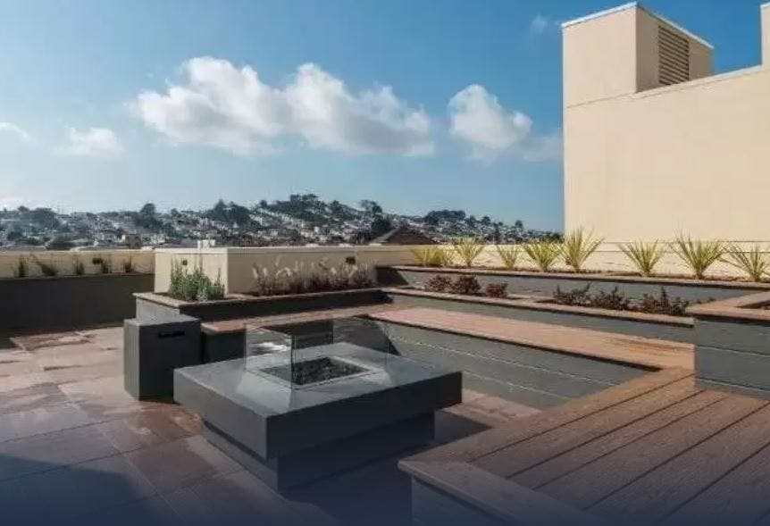 Along with the dining area and barbecue, the roof deck holds lounge seating around a firepit that creates the perfect hang out or gathering space. 
