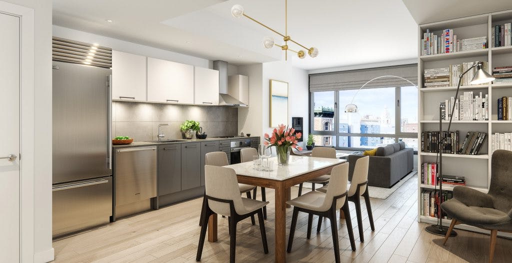 The kitchens and interiors in Stage 1075 are designed with hardwood flooring, stainless steel appliances and fixtures, and quartz countertops. 