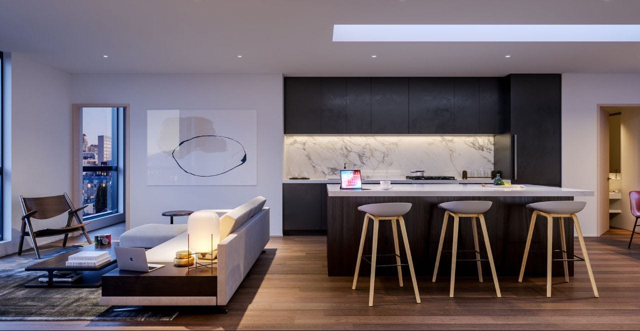 The kitchens in Maison a Soma are furnished with a cooktop and wall oven by Bertazzoni, dishwasher by Bosch, refrigerator, quartz countertops, sheer black cabinetry, integrated LED cabinet lighting, and a natural gas range with stainless steel finish. 