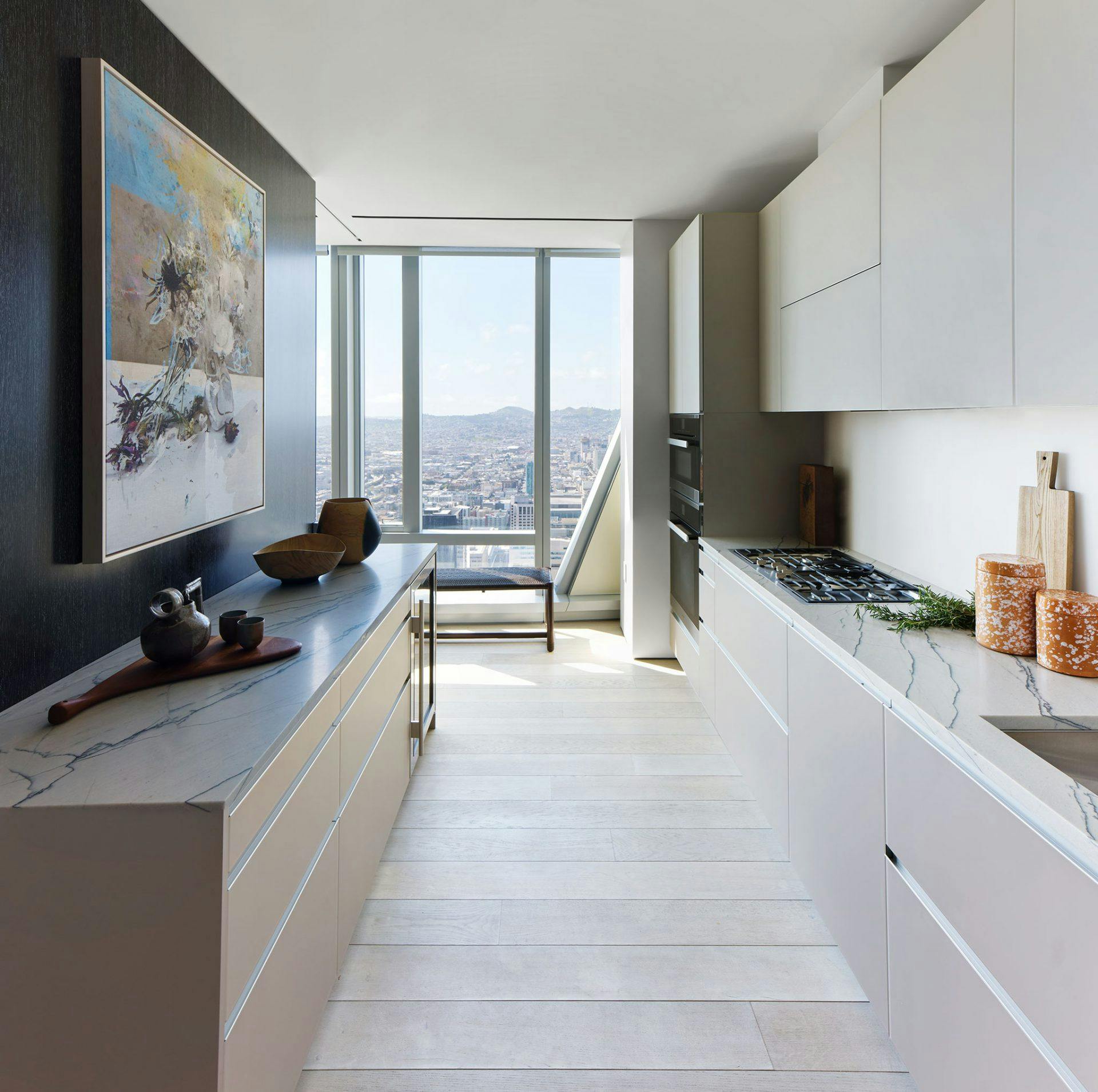 The kitchens at 181 Fremont are sleek in style, efficient in set up, and modernistic in design. Be it cooking dinner for one, two, or a friendly gathering, these kitchens have what it takes to meet your needs as a chef. Photo courtesy of the 181 Fremont website.