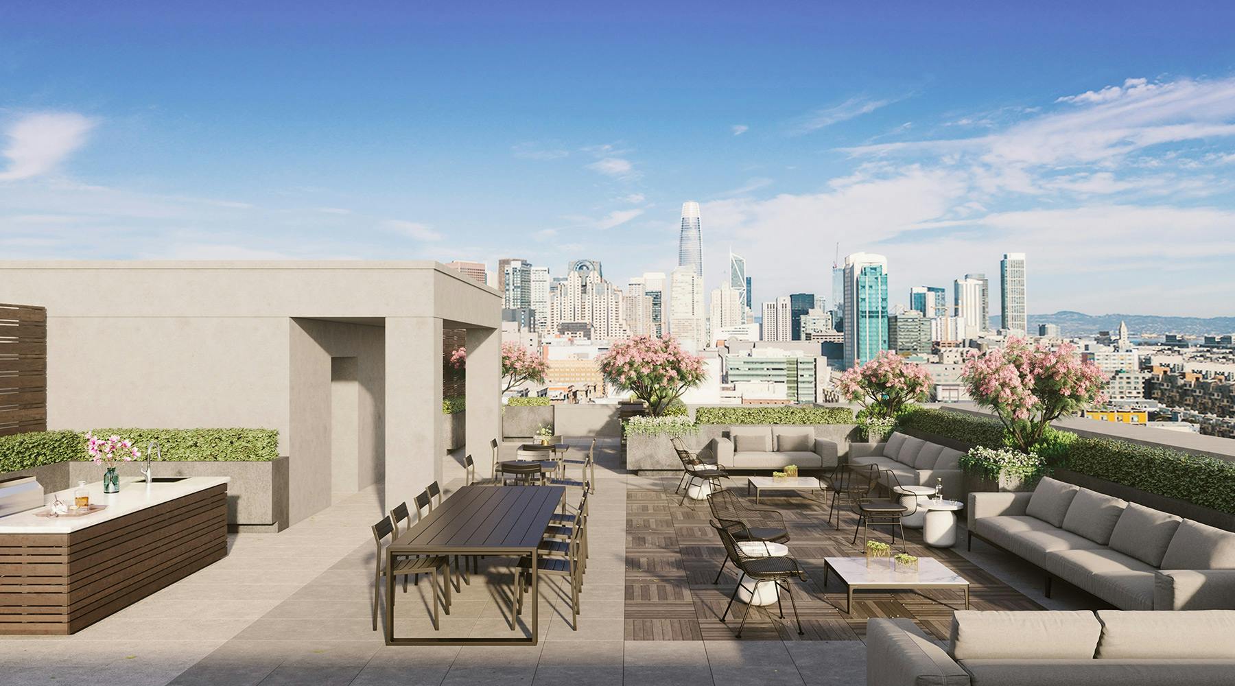The rooftop terrace at OneEleven SF is adorned with lounge seating, a barbecue island, and dining area. It has access to impressive views of the San Francisco City Skyline. 