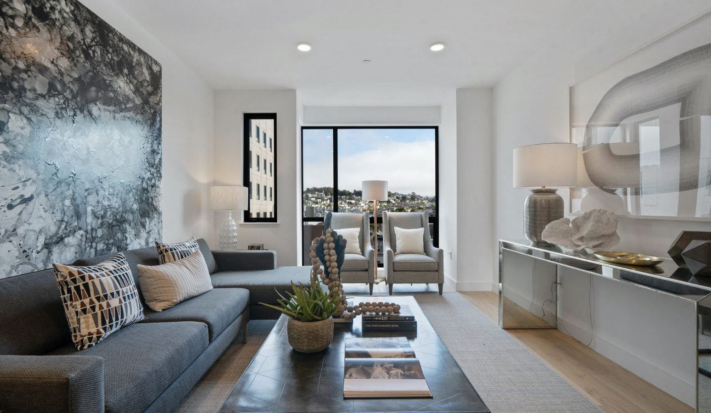 White oak hardwood flooring, open floor plans, and large windows make way for luminous natural lighting that elevate the grand experience of living in Mission Modern.