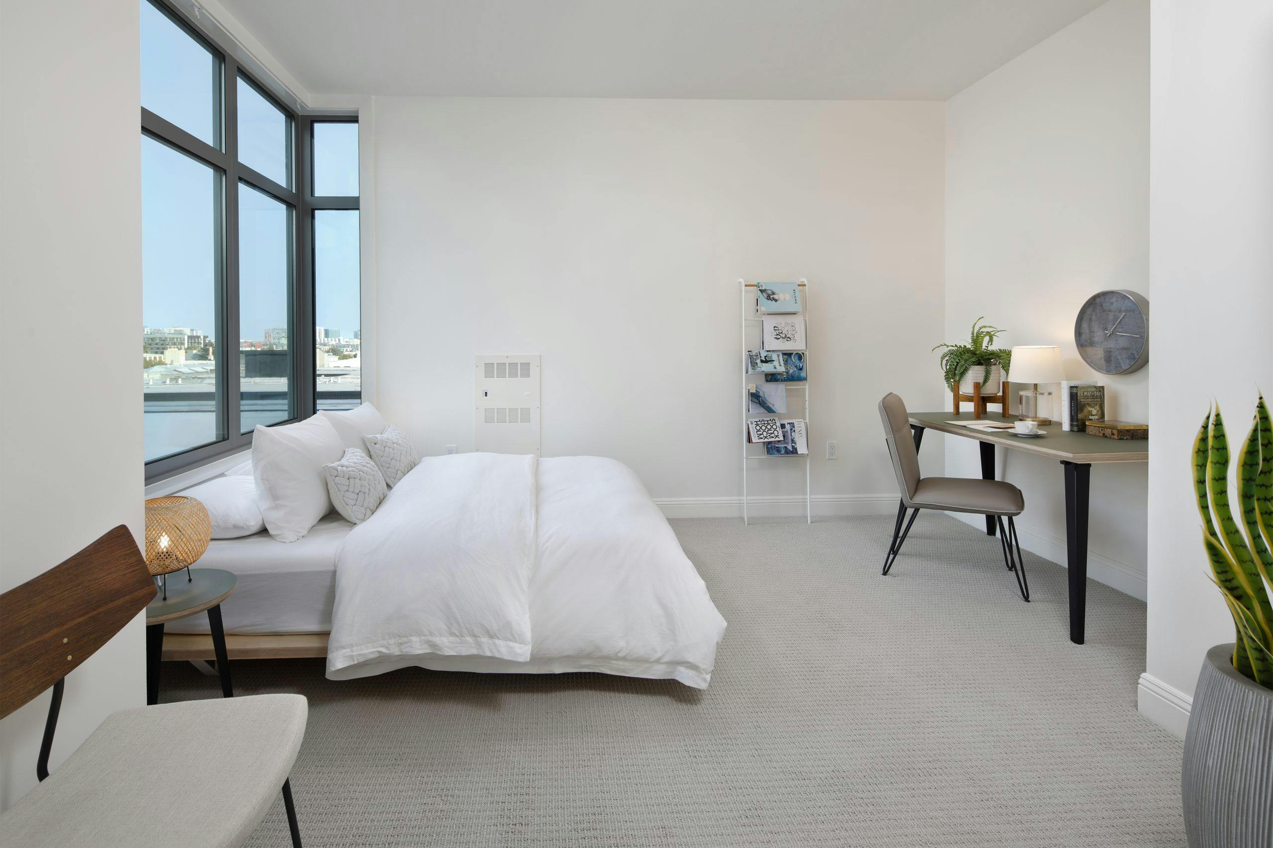 In contrast with the living rooms, the bedrooms in the OneEleven SF are adorned with soft carpet. They are spacious and well designed, allowing for a pleasant resident experience.