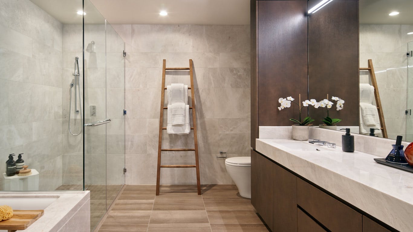 The bathrooms in the Avery are spacious, relaxing, and contemporary in design, made to satisfy all your needs and look stylish while doing so. Photo courtesy of The Avery Website. 